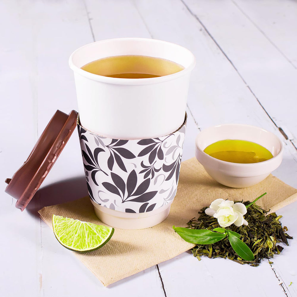 Tea Zone steeping green tea in cup shows inviting color and jasmine fragrance.