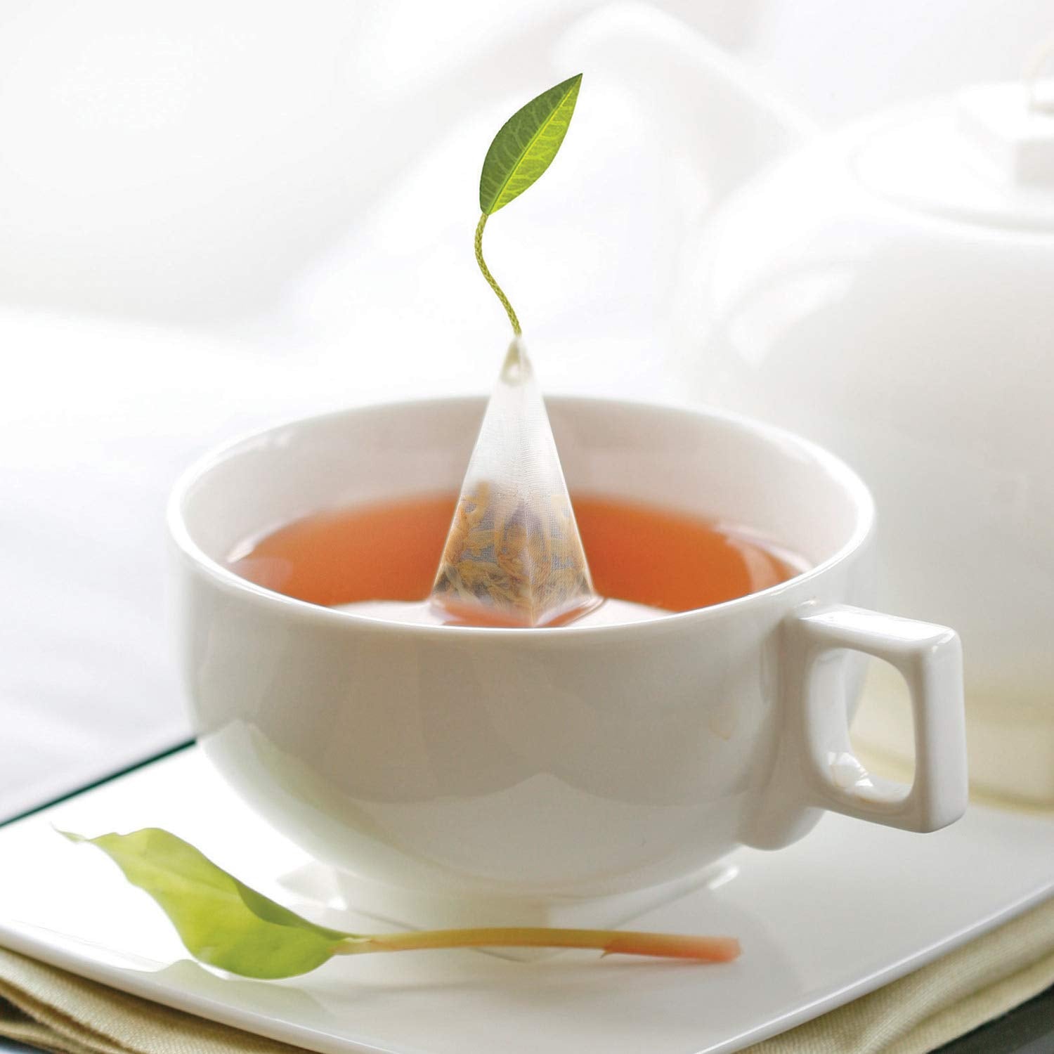Tea Forte Chamomile Citron pyramid infuser captures calming citrus aroma