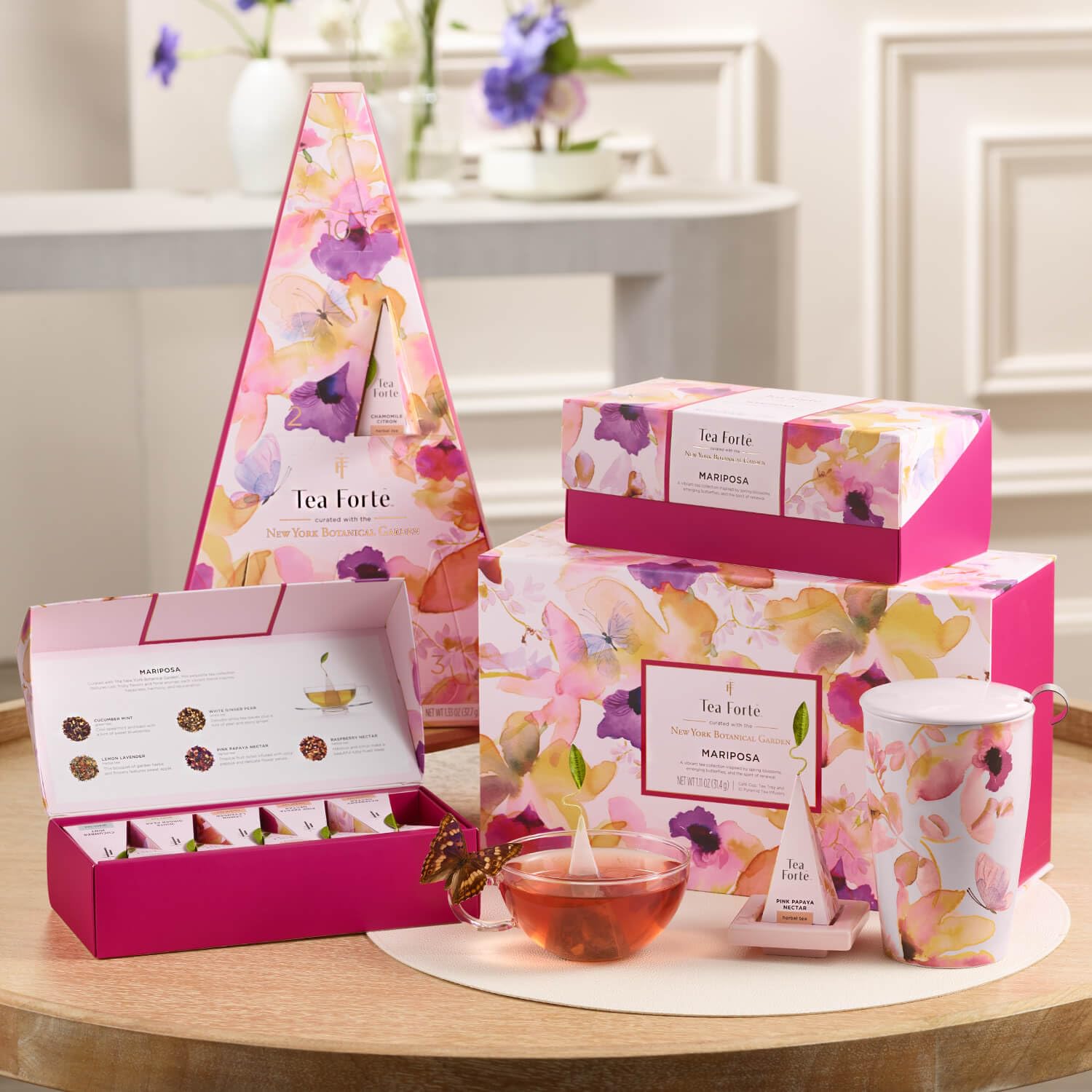 Tea Forte Raspberry Nectar tea bag swirling in tea, inviting a fruity sip.