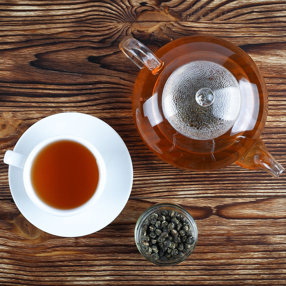 Tealyra Imperial Jasmine Dragon Pearls steeping at 80-85°C preserves aroma.