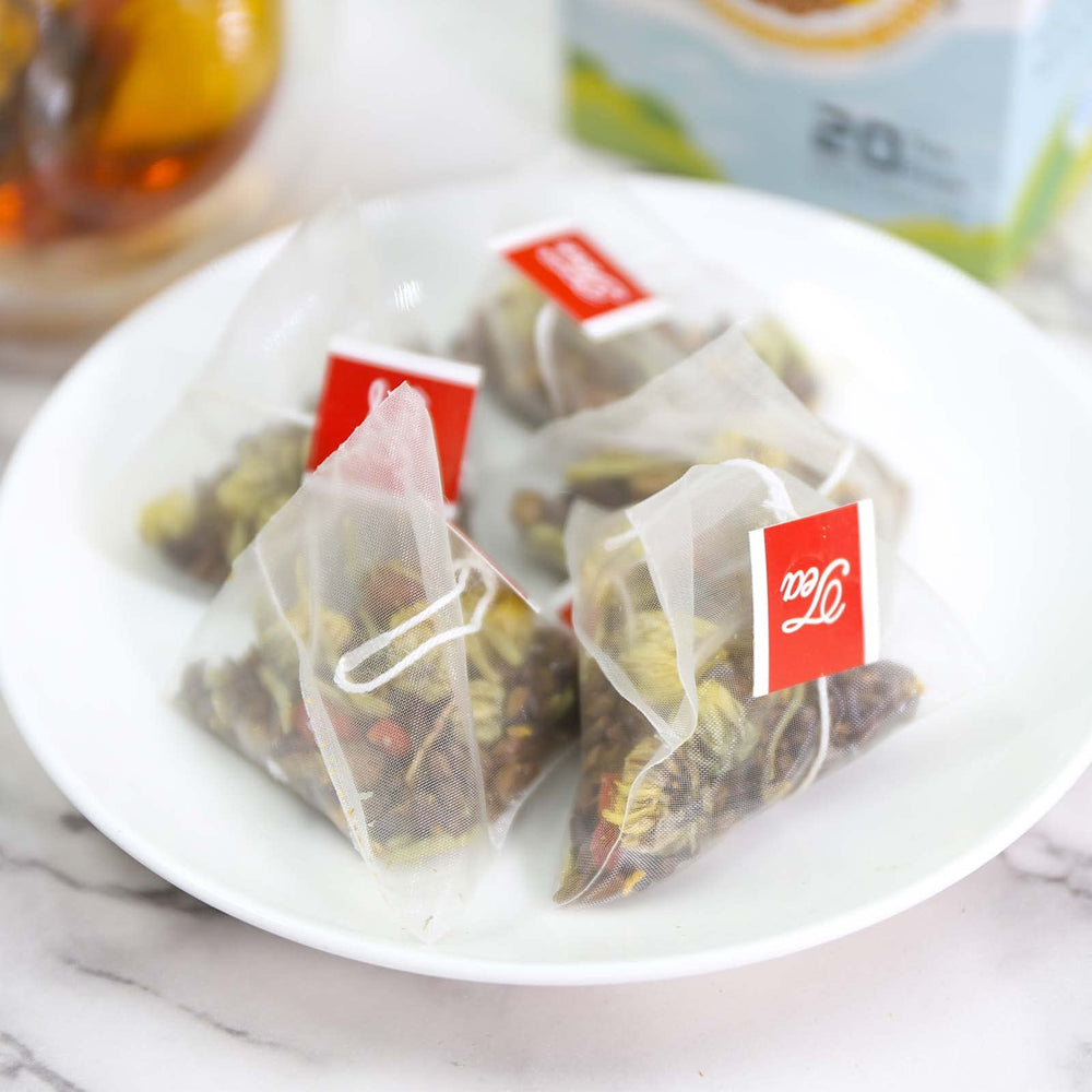 TEARELAE herbal blend with burdock root and goji berries in a clear bottle.
