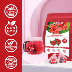 TEARELAE steeped hibiscus infusion in a glass with deep red color