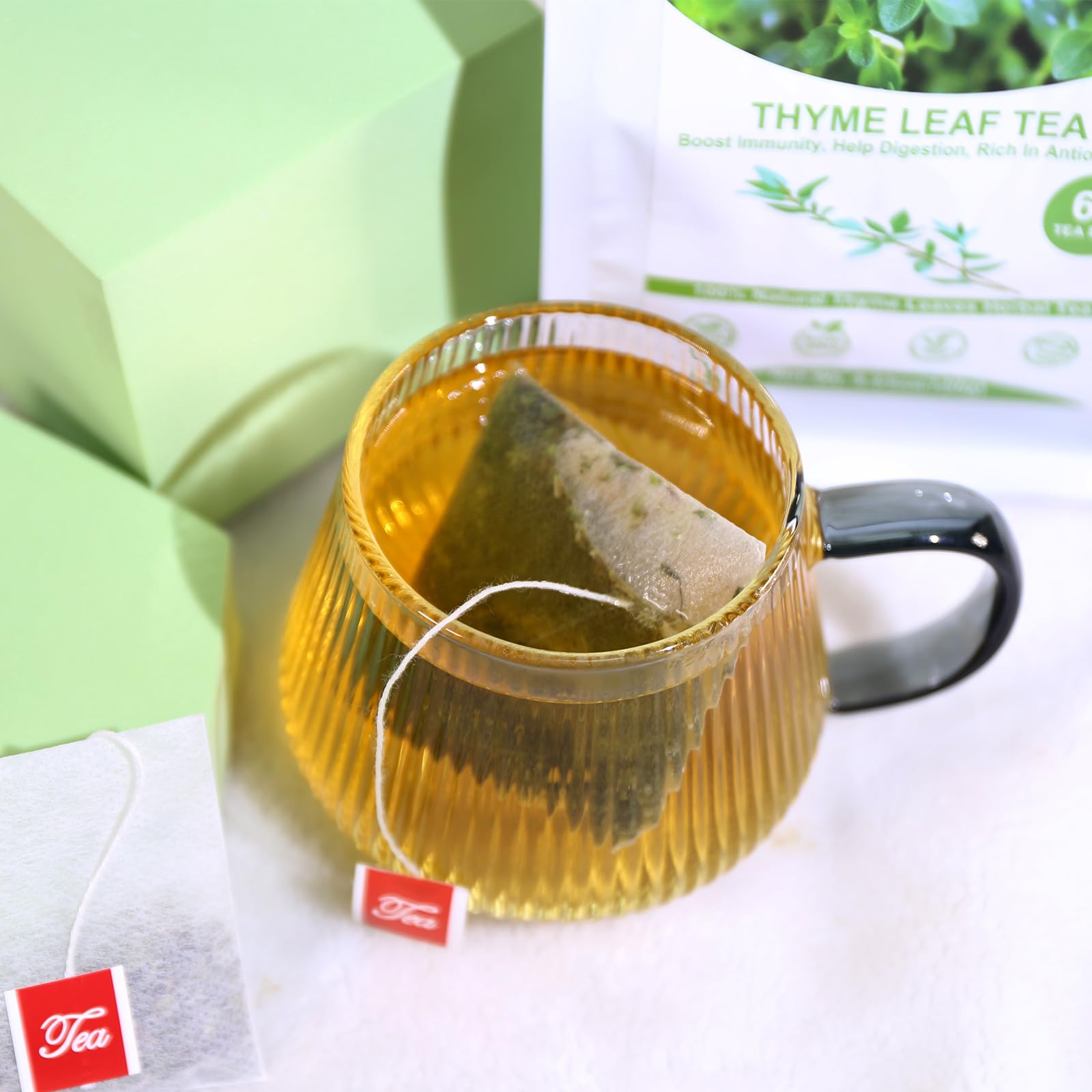 TEARELAE tea bags steeped in hot water releasing earthy notes