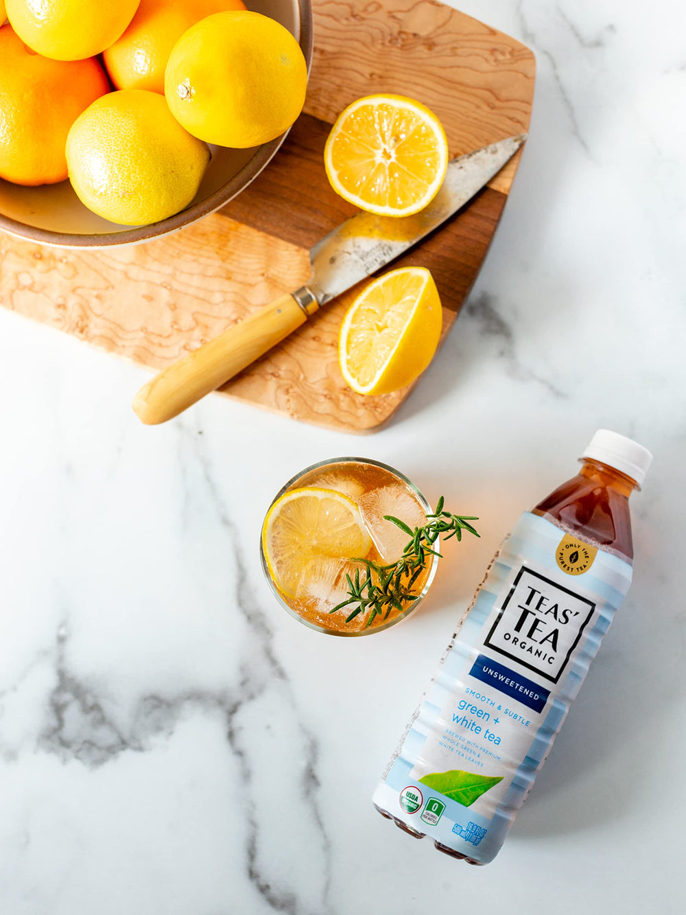 Teas' Tea iced tea glass pour highlights refreshing flavor and color.