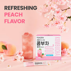 TEAZEN Peach Kombucha fizz in a glass delivering a fruity aroma.