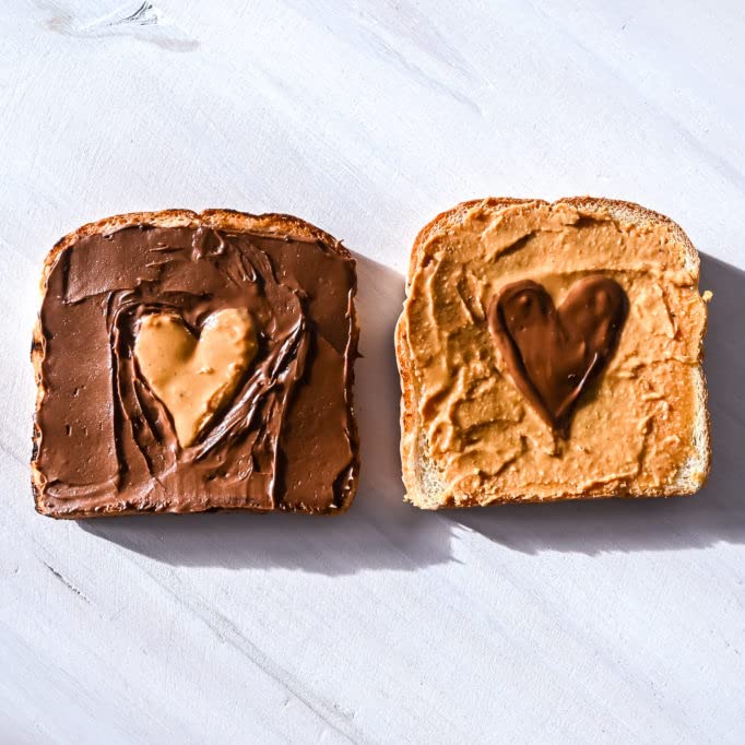 Opened Teddie All Natural Peanut Butter Super Chunky jar reveals chunky peanut pieces.