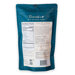Teeccino Dandelion Tea bag close-up highlights 6g herb blend for richer flavor.