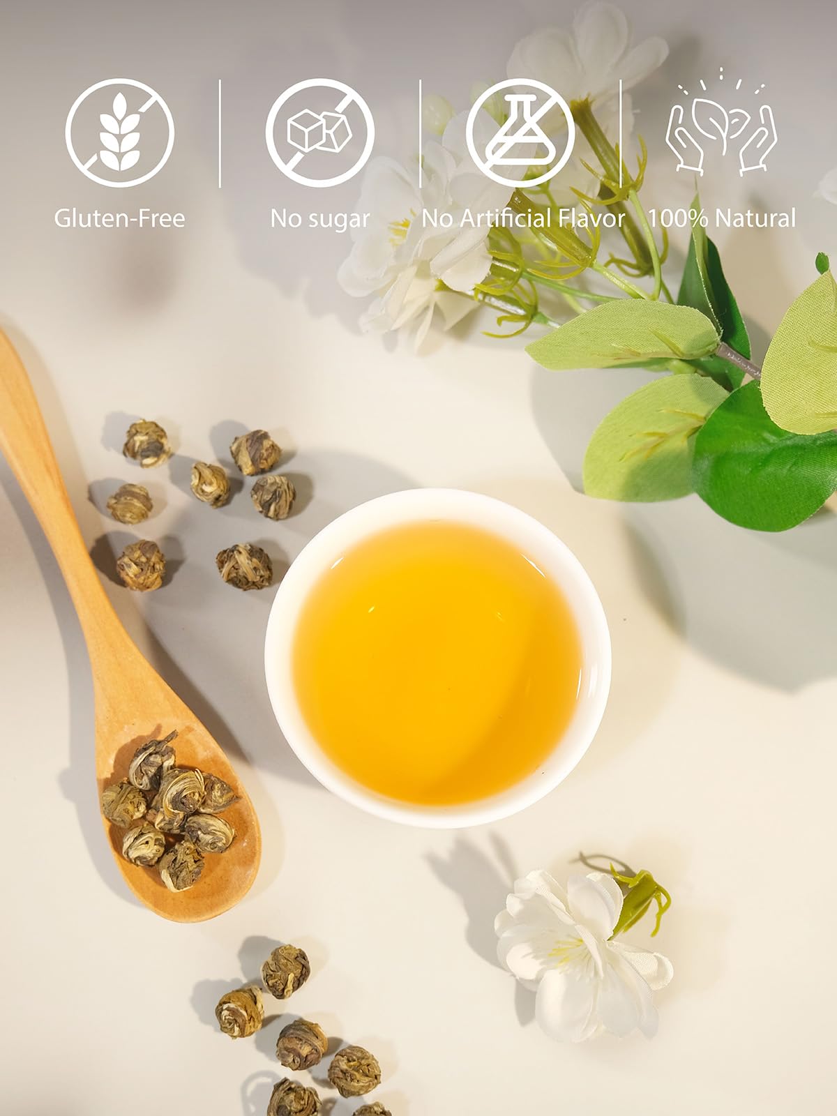 TeeLux jasmine green tea aroma rises from a warm cup.