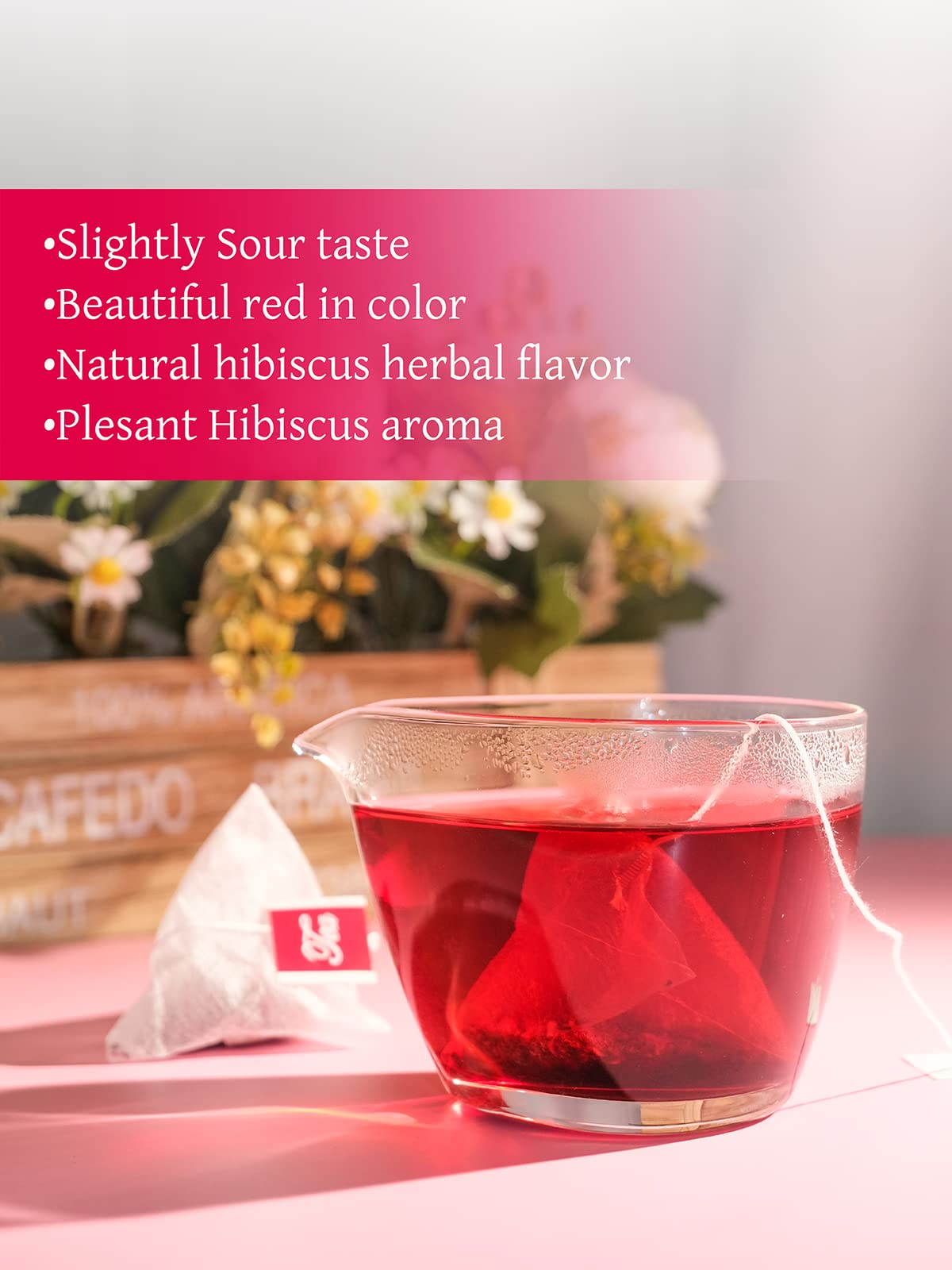 TeeLux hibiscus tea bags served hot in a cozy cup.