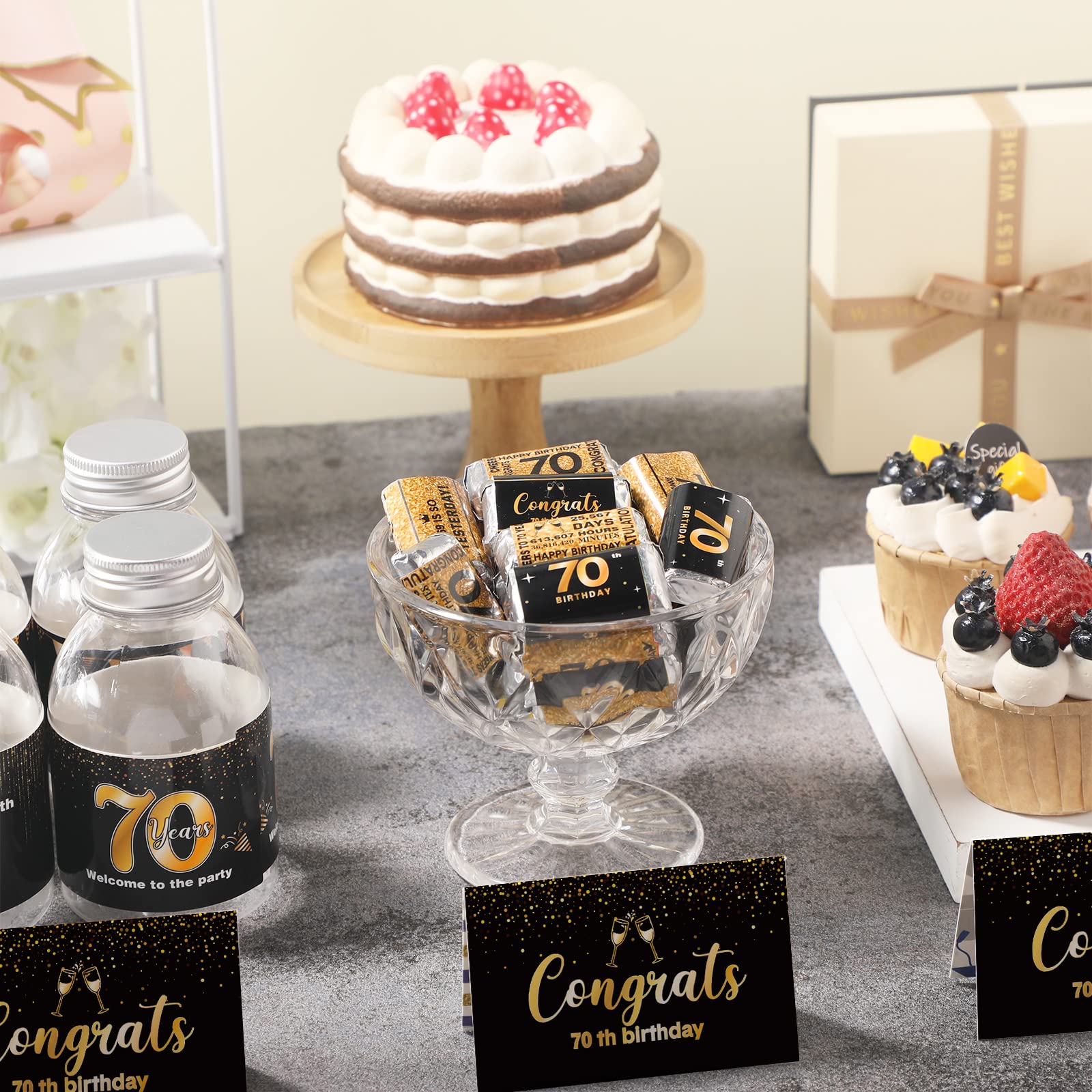 Tenare 70th birthday stickers used on gift wraps and envelopes for coordinated decor.