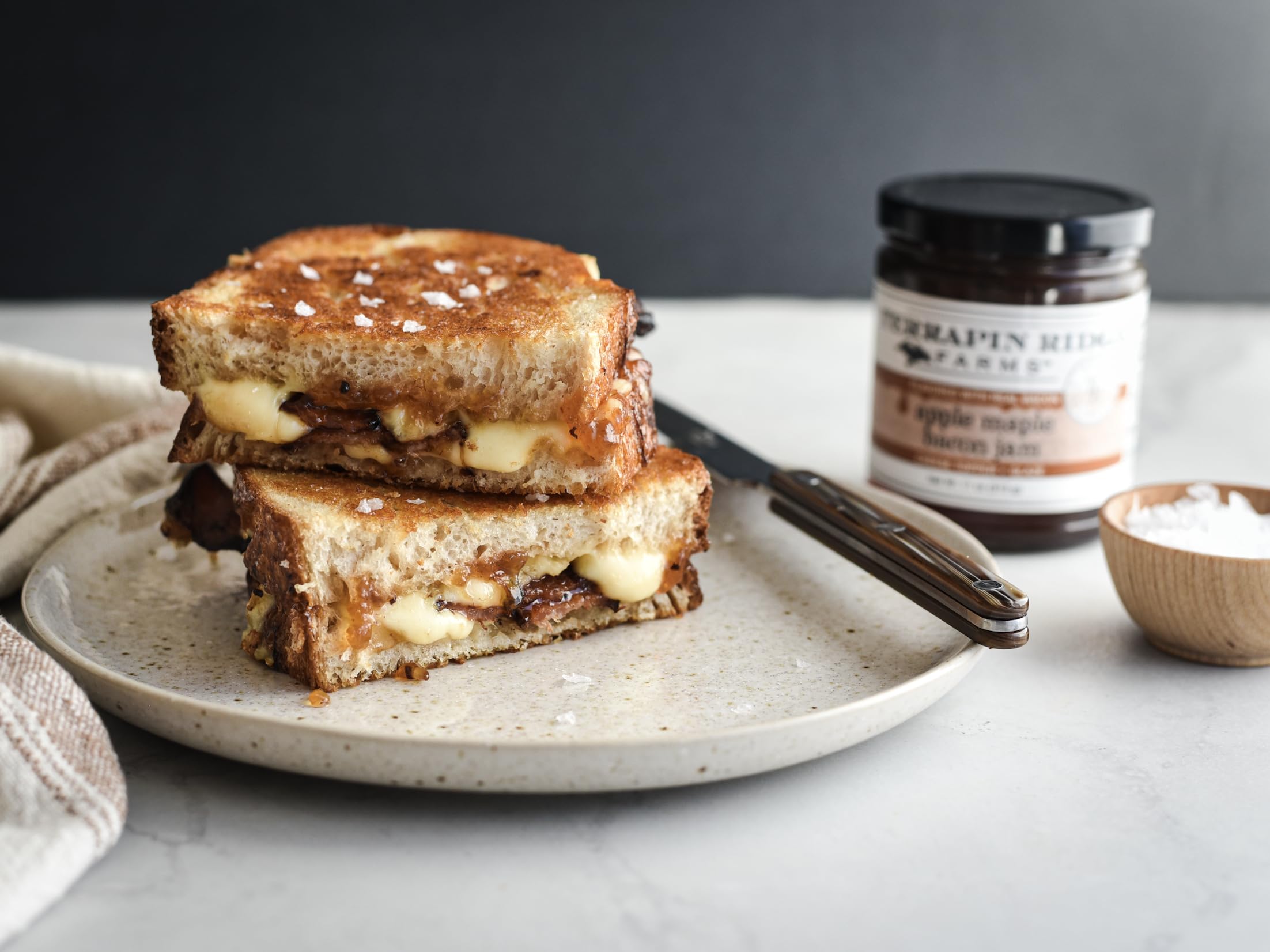 Terrapin Ridge Apple Maple Bacon Jam glaze on turkey breast slices.