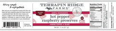 Terrapin Ridge preserves jar close-up highlighting ripe raspberries and jalapeños