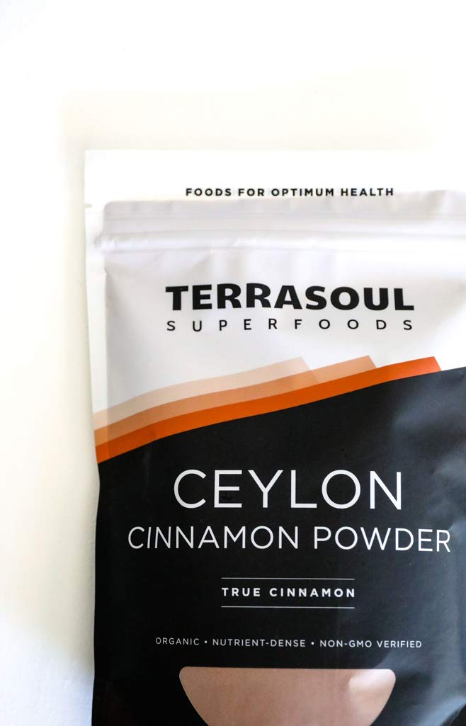 Terrasoul cinnamon powder featured in kitchen scene for baking and savory meals.