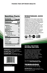 Terrasoul wheat-grass powder being poured into smoothie for energy