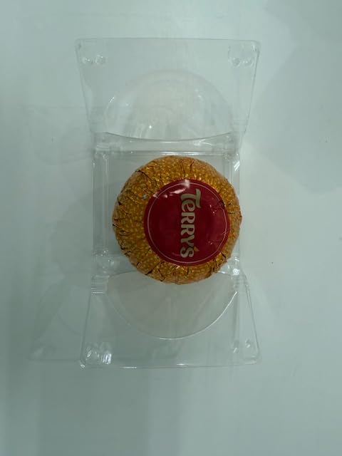 Terry's Chocolate Orange Dark Ball 145g texture closeup cacao surface and citrus sparkle