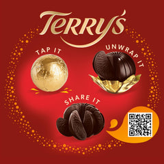 Close-up of Terry's orange-wrapped chocolate segments, rich cocoa with citrus aroma.