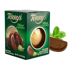 Terrys Mint Milk Chocolate Orange ball wrapped in gold foil, ideal for gifting.