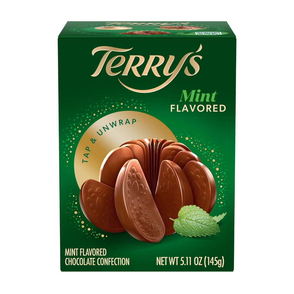 Terrys Mint Milk Chocolate Orange ball being tapped to reveal slices.