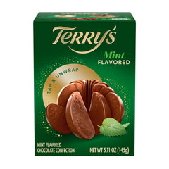 Terrys Mint Milk Chocolate Orange ball being tapped to reveal slices.