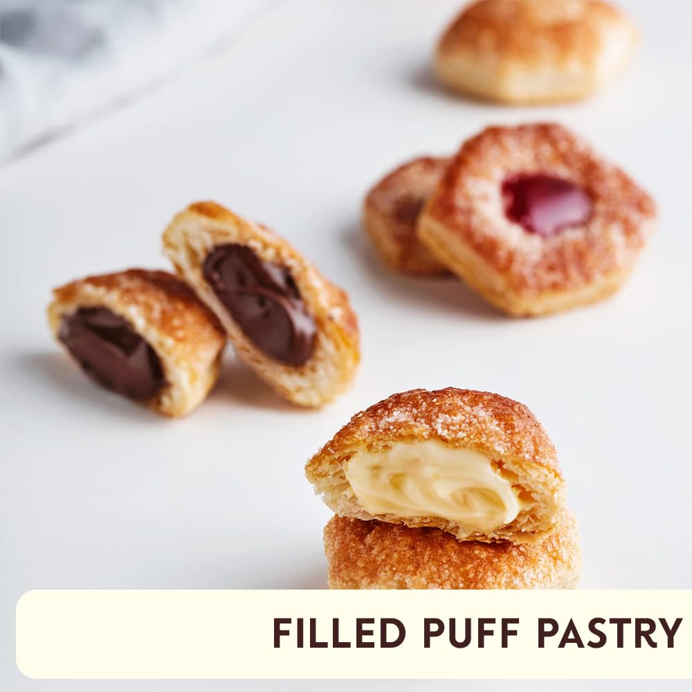 Tesoro chocolate cream center close-up—creamy core inside a buttery, airy puff pastry.