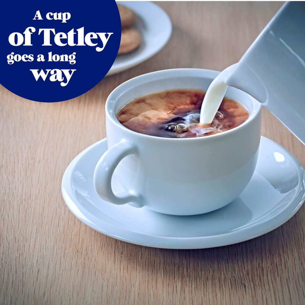 Tetley Decaf tea amber infusion in cup, comforting aroma