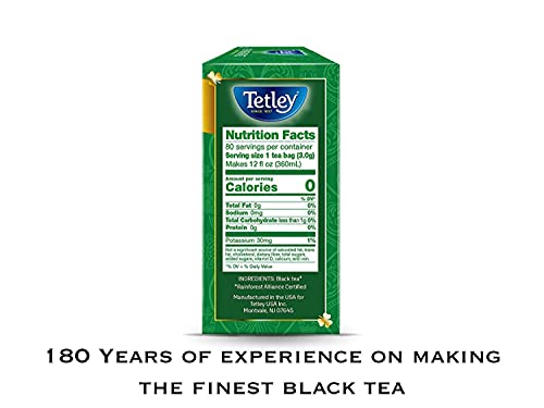 Tetley Irish Breakfast tea bag rounds, no strings, ready for quick steeping.