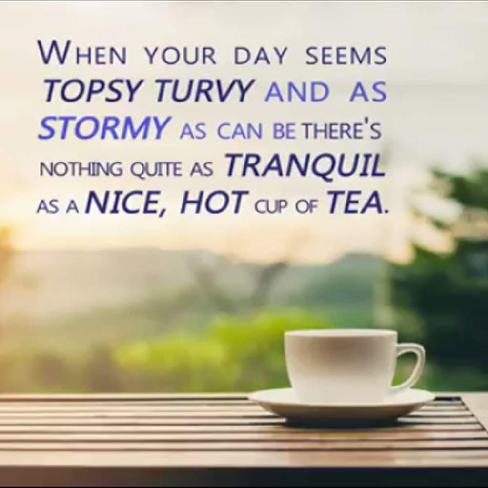 Steaming cup of Tetley green tea highlighting fresh aroma.