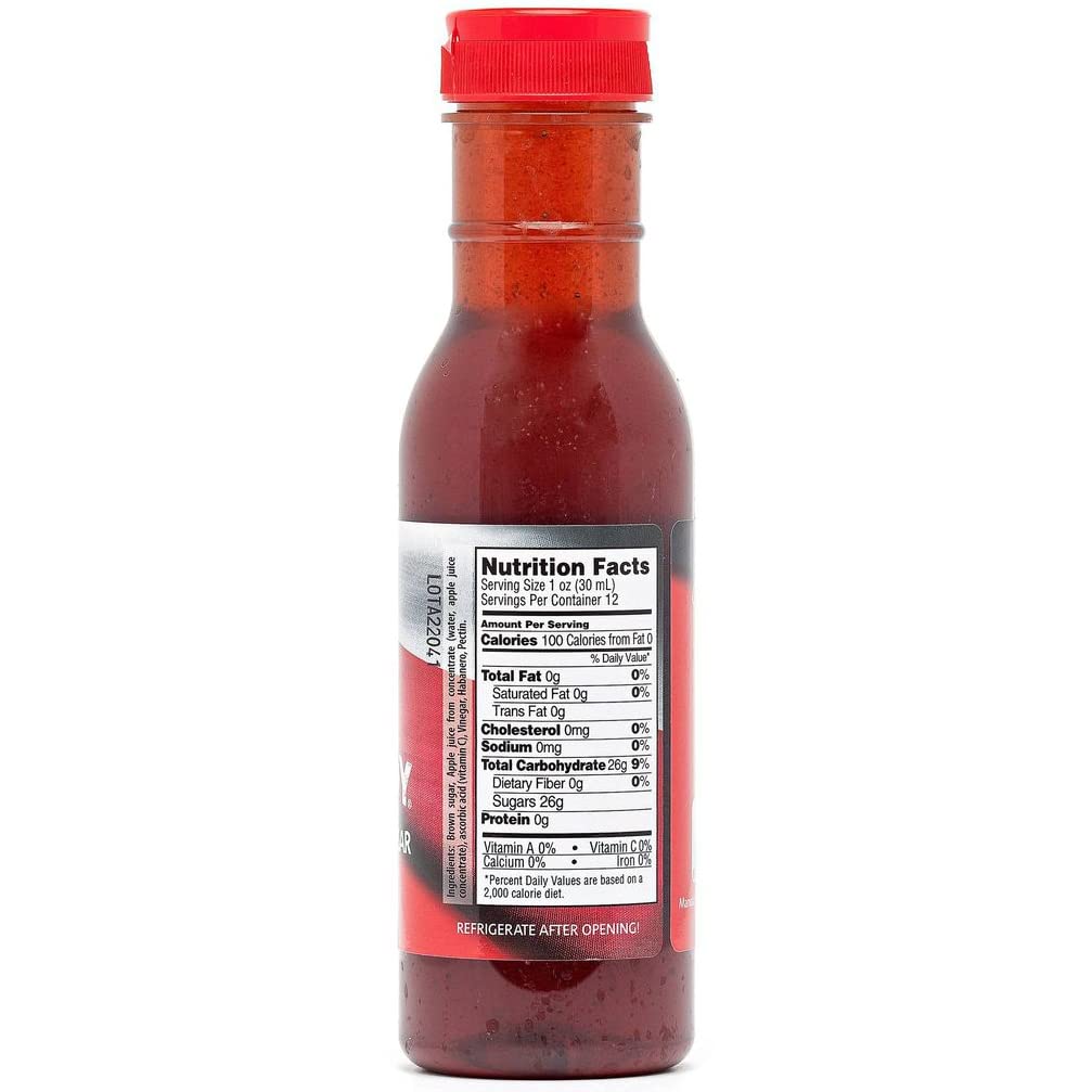 Texas Pepper Jelly Rib Candy bottle pour image, perfect for brushing during cooking