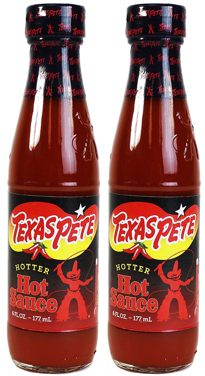 Texas Pete Hotter Hot Sauce bottle with bold heat for flavorful meals.