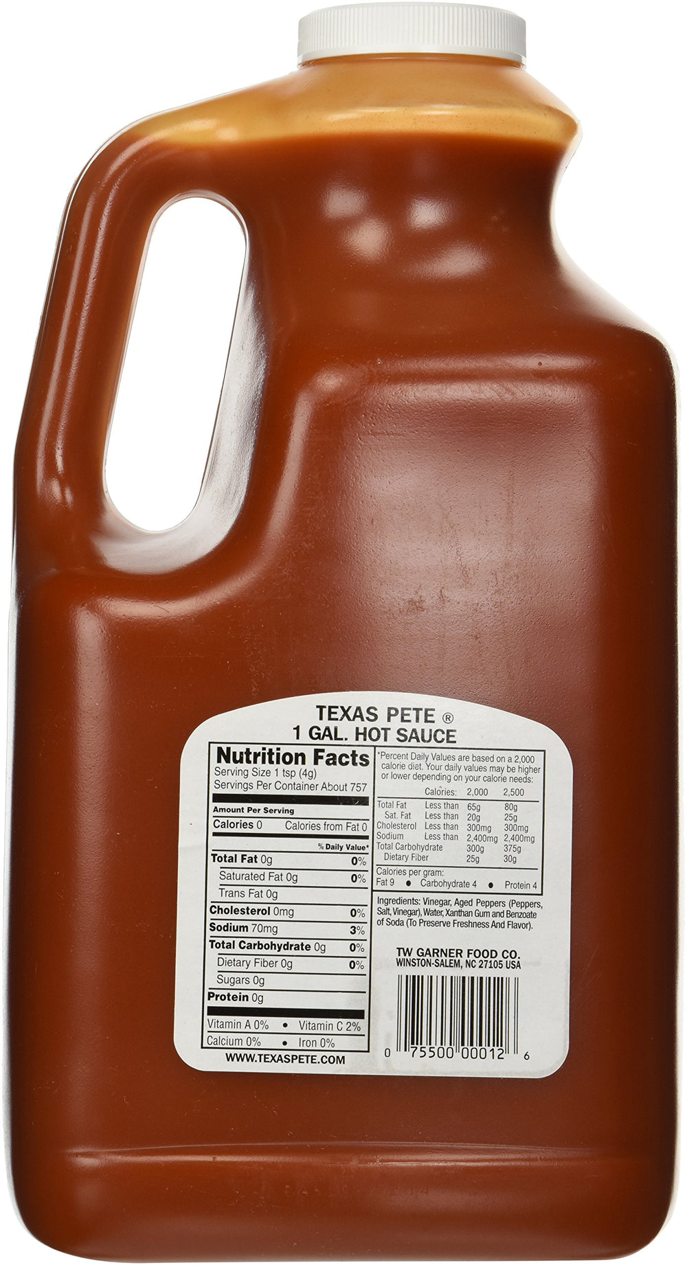 Texas Pete Original Hot Sauce being poured, ideal for spicing burgers and chili.
