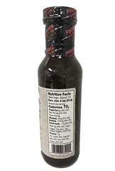Six-pack display of T.G.I. Fridays Signature Whiskey Sauce bottles for family meals.