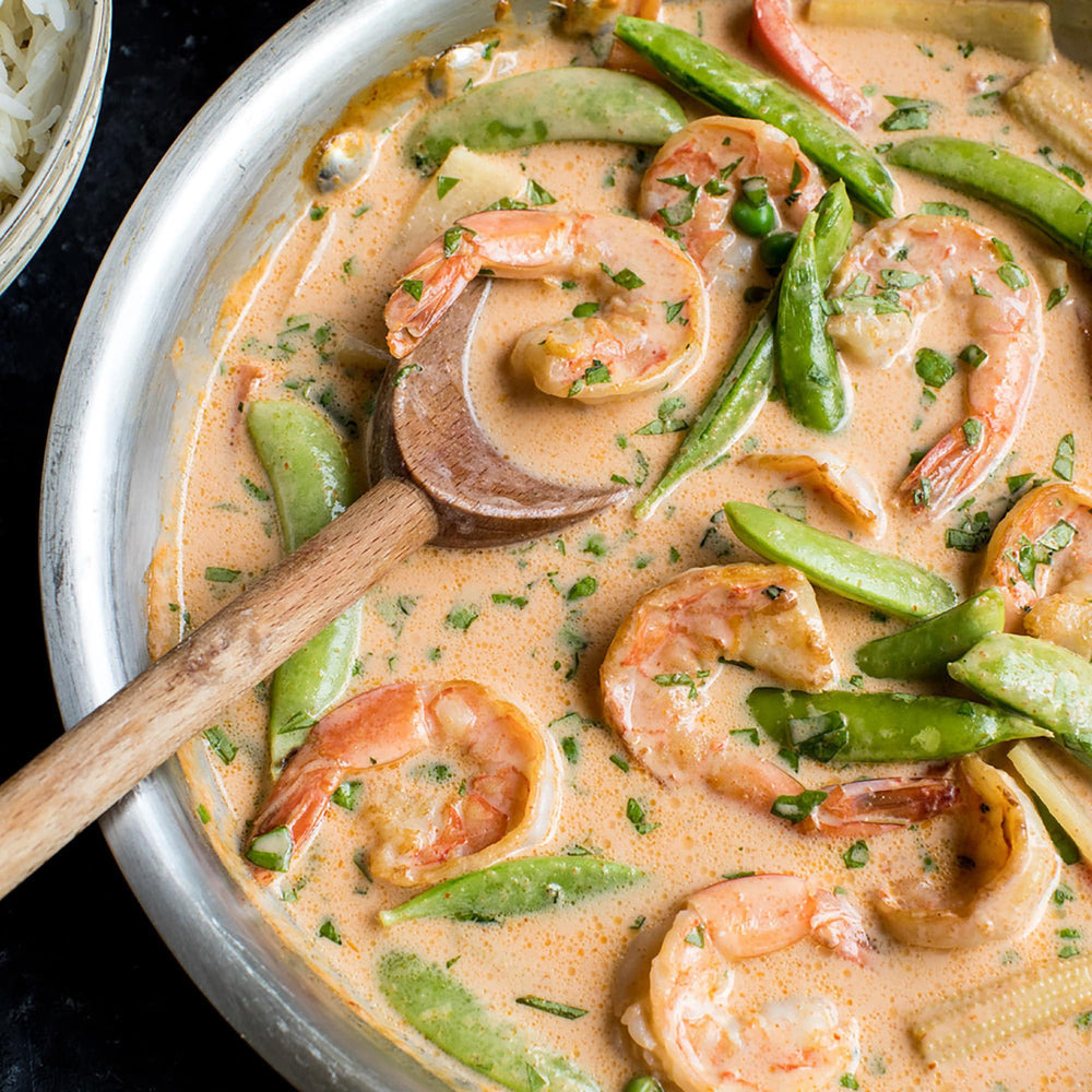 Baking with Thai Kitchen Unsweetened Coconut Milk for richness.