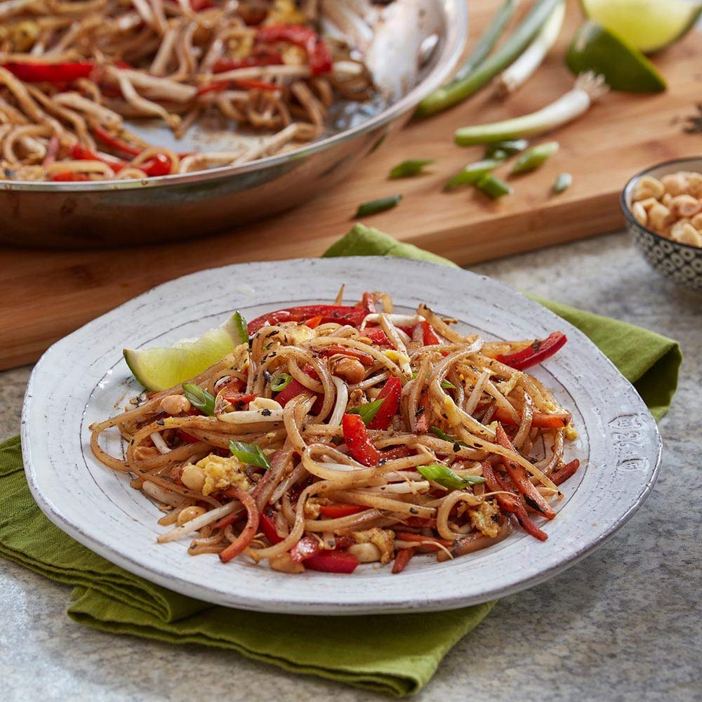 Stir-fry scene enhanced by Thai Kitchen Pad Thai Sauce.