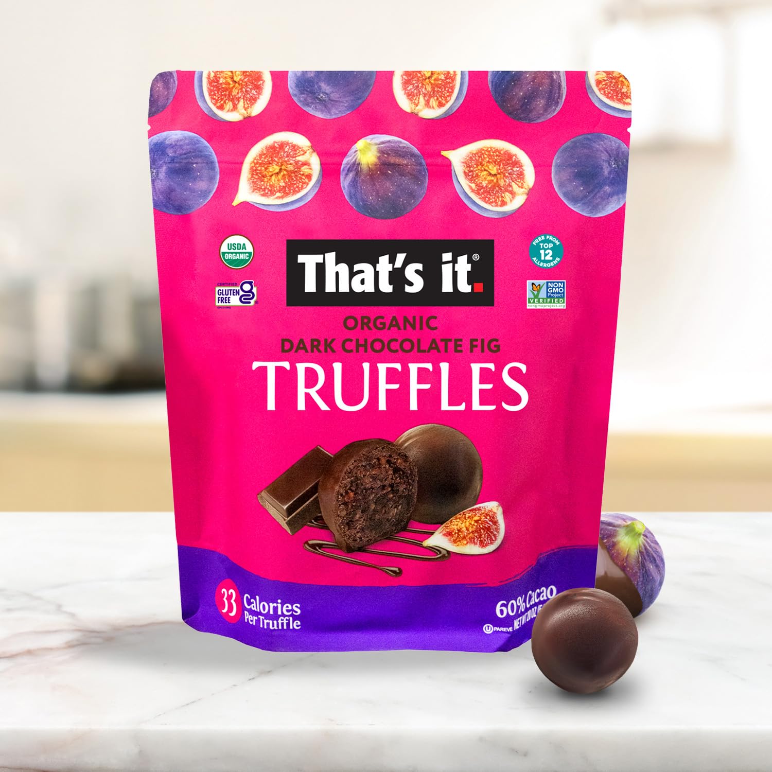 That's It truffles served on a wooden board, inviting chocolate aroma and smooth fruit sweetness.