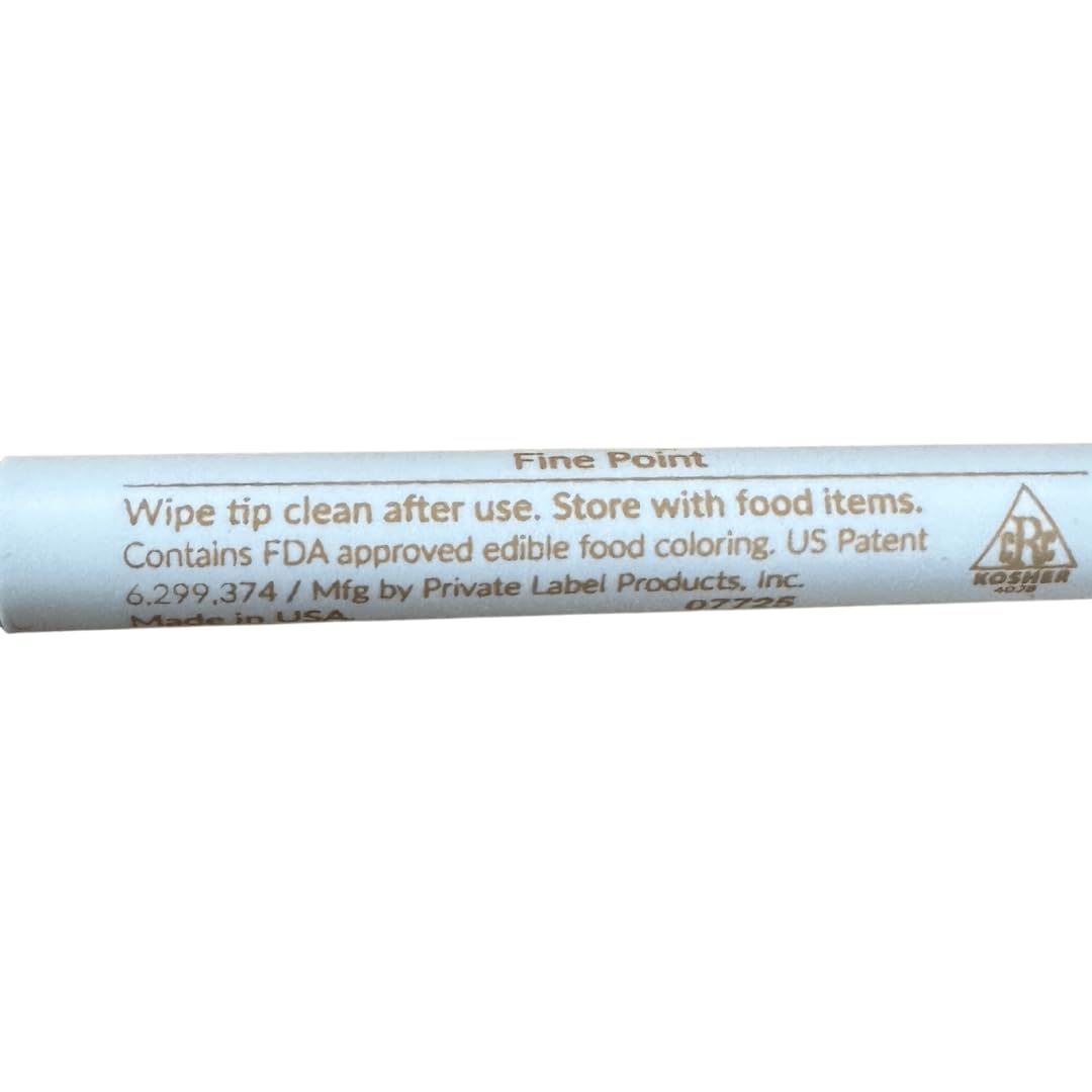 The Cookie Countess beige fine tip marker draws on fondant for precise planning.