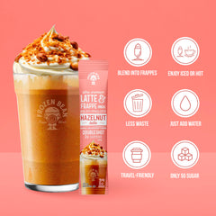 The Frozen Bean hazelnut frappe steaming mug reveals a cozy latte moment with rich aroma.