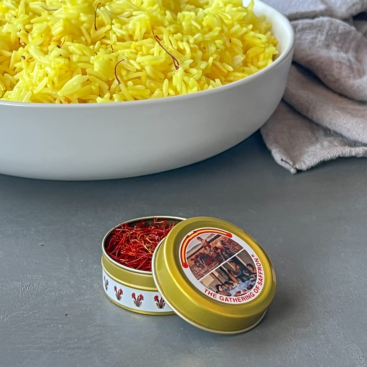 The Gathering of Saffron packaging with gold-foil signals heritage and premium quality.