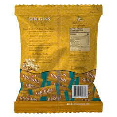 Close-up of The Ginger People Gin Gins spicy turmeric ginger chews in an open pack.