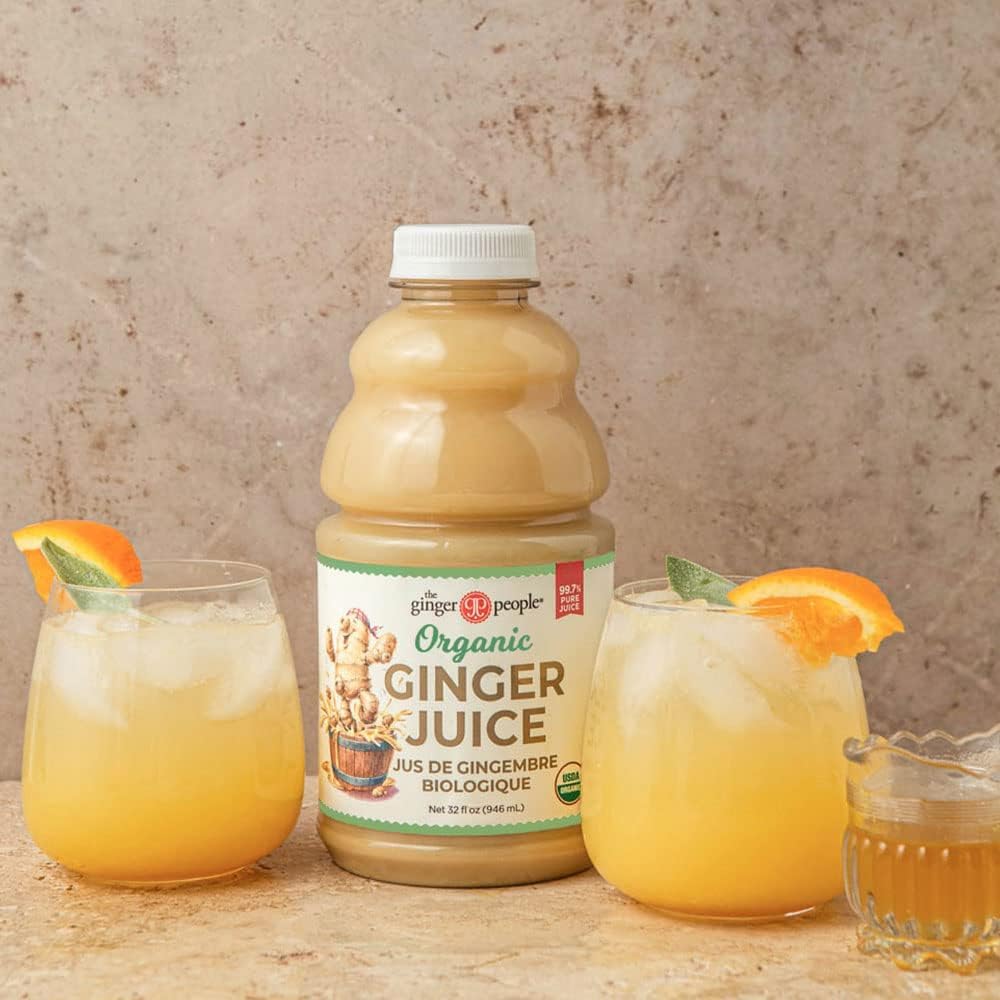 Ginger juice poured into a glass, suggesting a refreshing wellness drink.