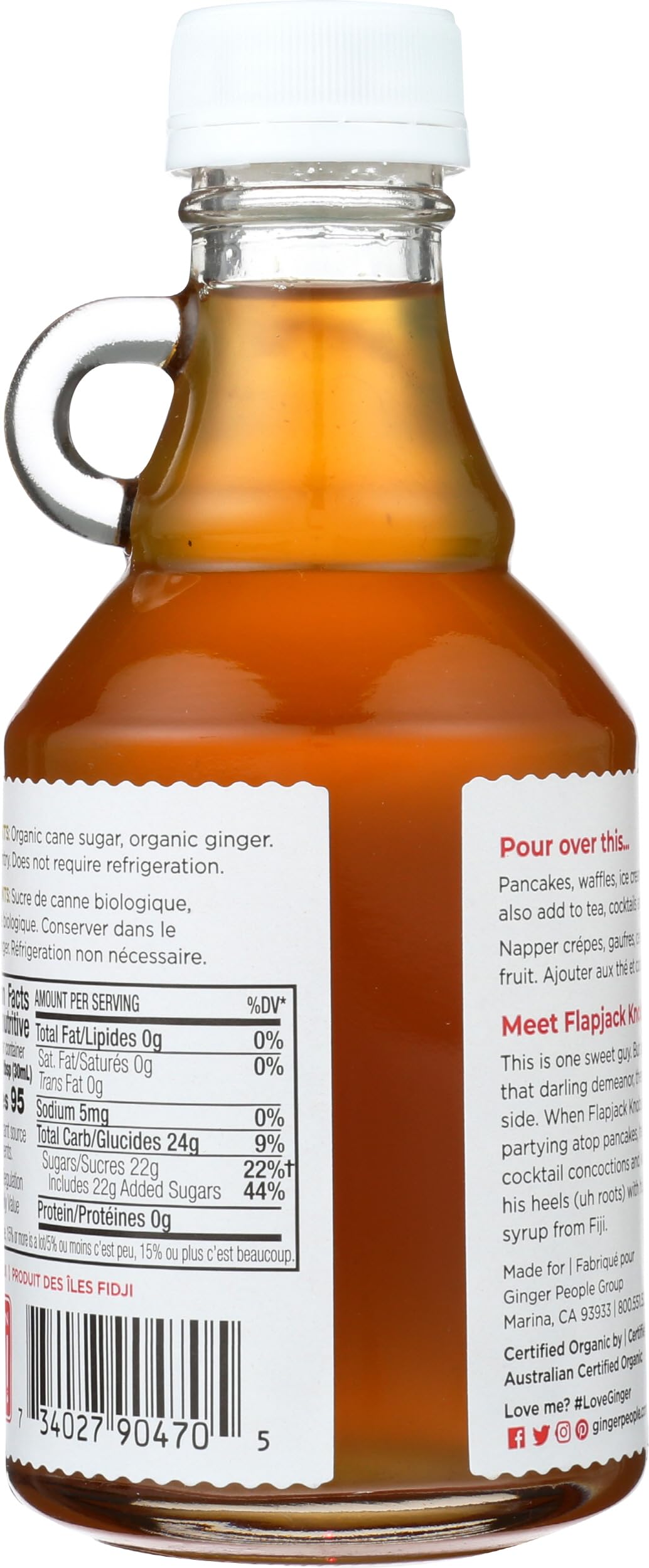 Pour-closeup of The Ginger People organic ginger syrup showing rich color and aroma