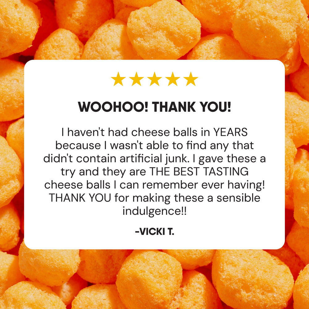 Opening The Good Crisp Company cheddar cheese balls package invites a quick snack.