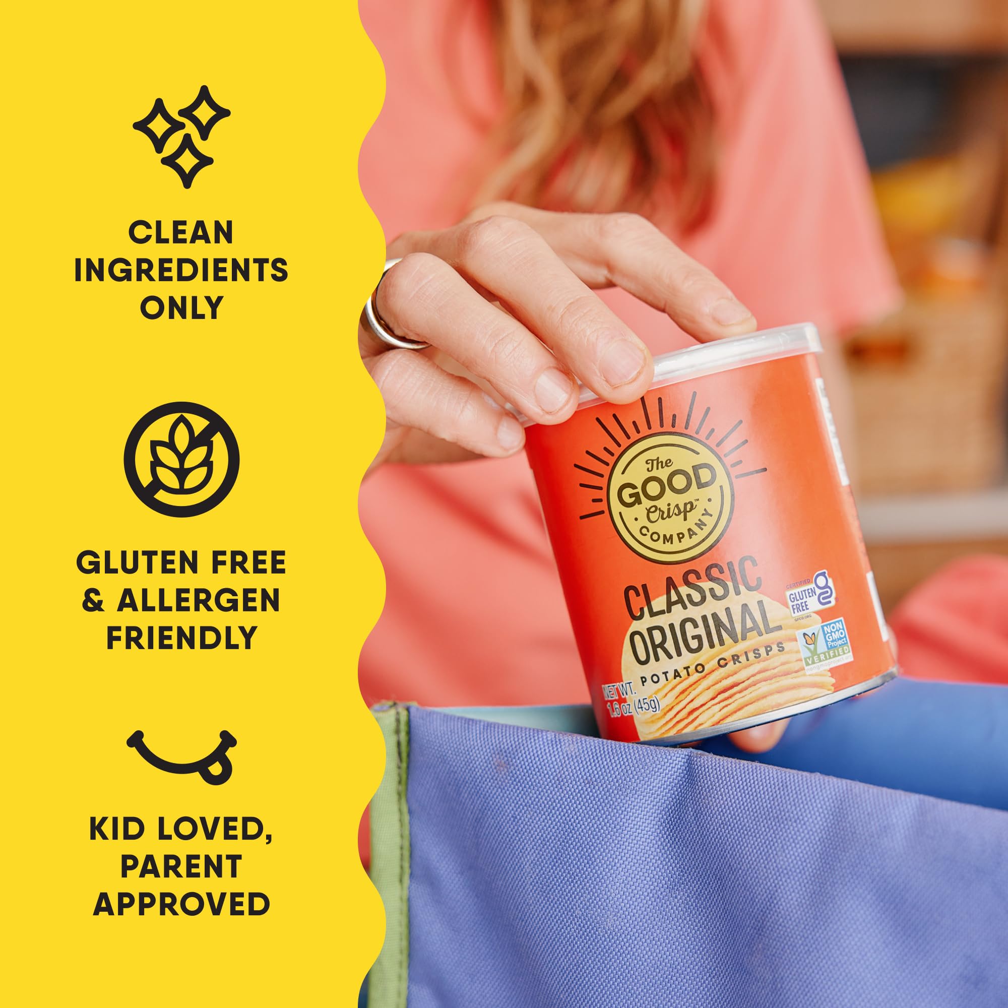 Hand holds The Good Crisp Company Good Crisps Minis Original pack for on-the-go snacking.