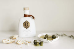 The Governor olive oil opaque bottle art conveys a refined, premium presentation.