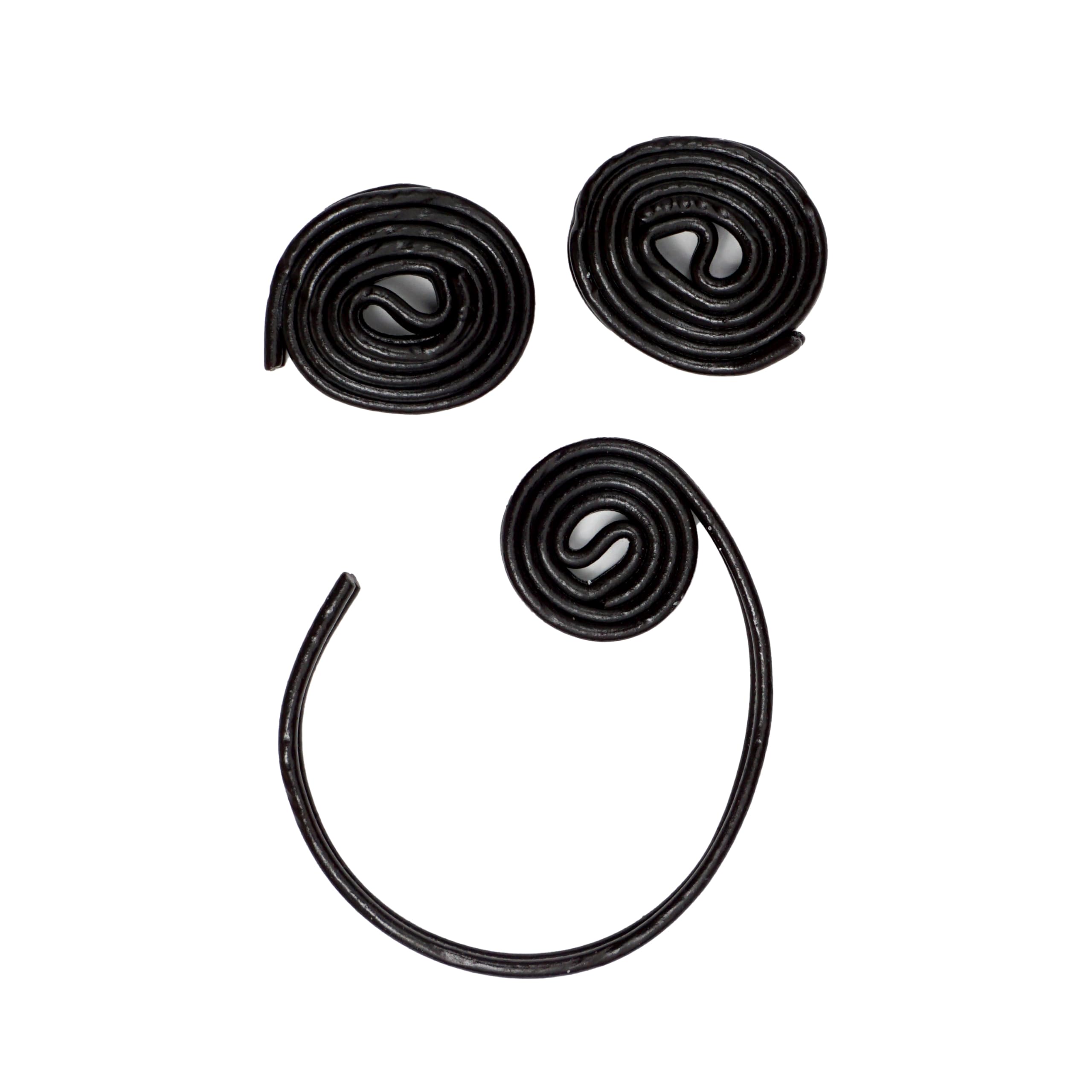 Hands holding a Broadway Licorice Wheel, convenient for on-the-go snacking and sharing.