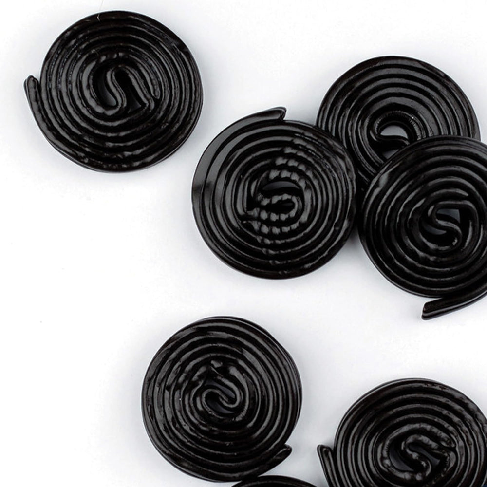 Party setting with Broadway Licorice Wheels as festive favors for gatherings.