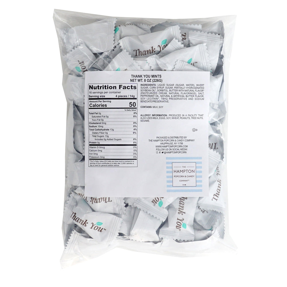 Close-up of creamy buttermints, showcasing smooth texture and minty refreshment.