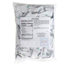 Close-up of creamy buttermints, showcasing smooth texture and minty refreshment.