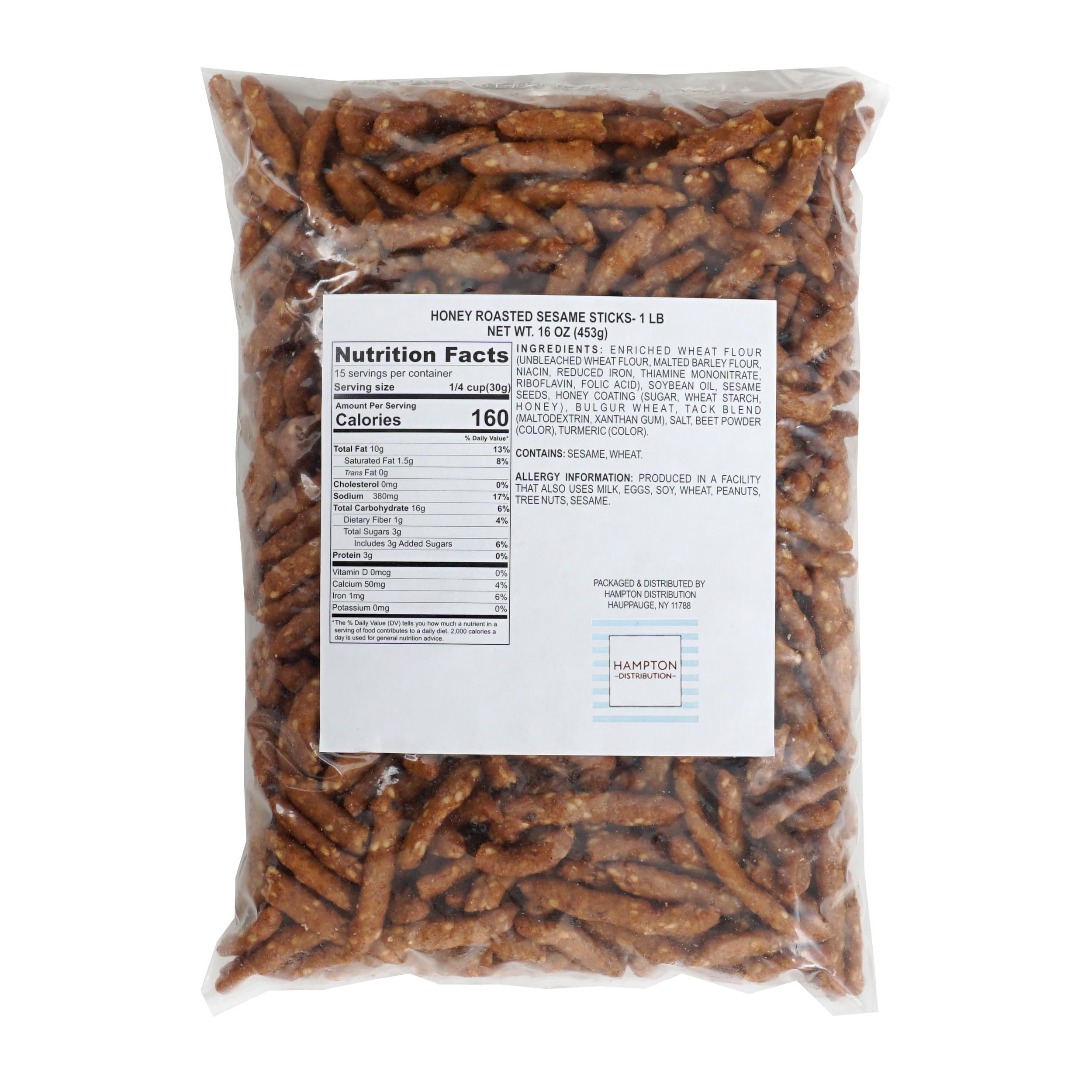 Closeup of honey roasted sesame sticks reveals crisp texture and glossy glaze.