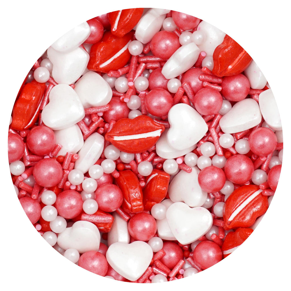 The Hampton Candy Company Lips & Hearts sprinkle mix bottle adds festive color to cakes and cupcakes.