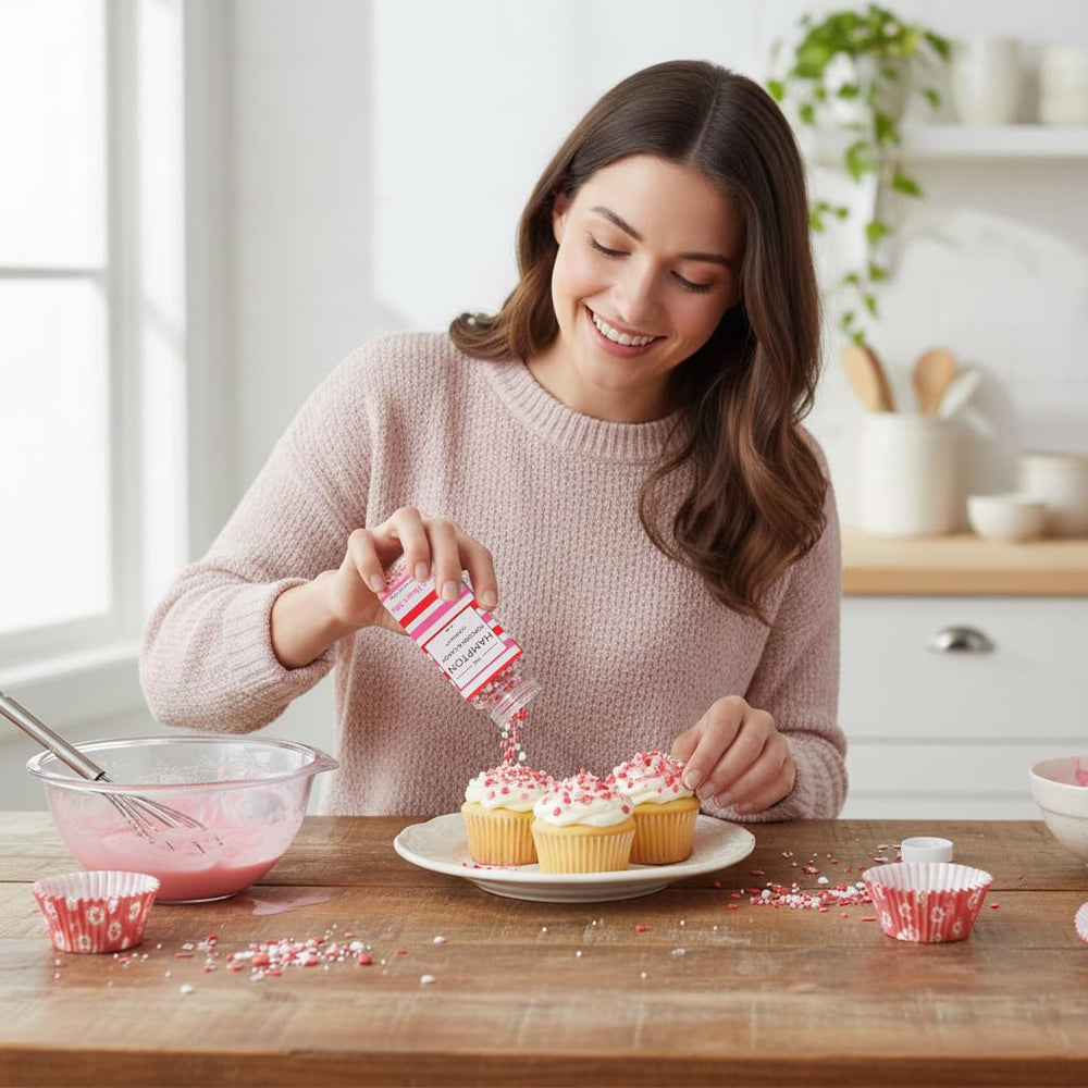 The Hampton Candy Company Lips & Hearts mix on cupcakes creates playful color and texture.